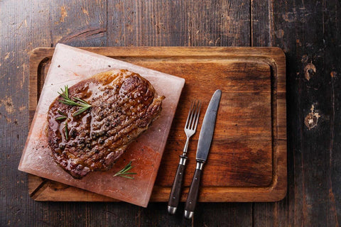 Grilled steak on a wooden board